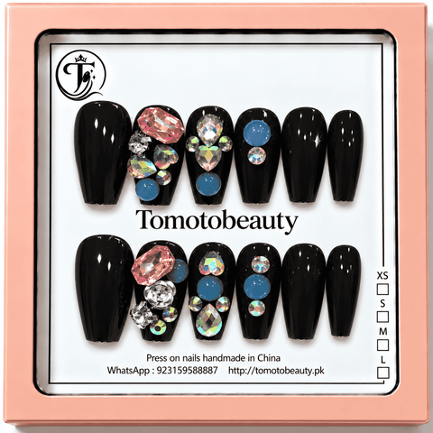 Tomoto Beauty A049 glossy black press on nails with large pink crystals, iridescent clear gemstones and blue round decorative accents