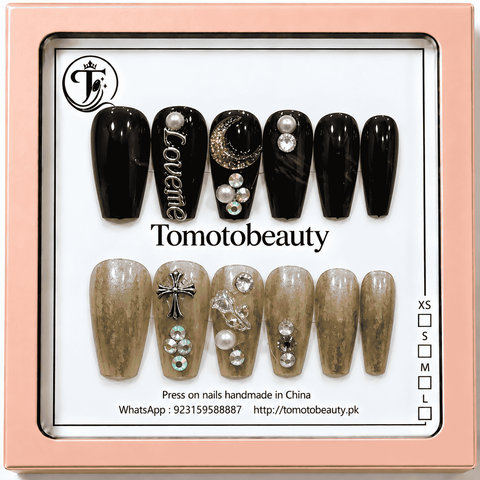 Tomoto Beauty A095 12 black and gold taupe glitter press on nails featuring crescent moon, Love me text charm, metallic cross, faux pearls, crystal rhinestones and butterfly decorations