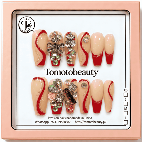 Red French swoosh nails with gold glitter line, crystal bow and pink rose decorations A130