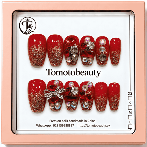 Sparkly ruby red glitter press on nails with crystal charms, silver bow and rhinestone decorations A131