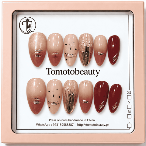 Dusty rose pink and deep burgundy almond press on nails with rose gold metallic line accents B001