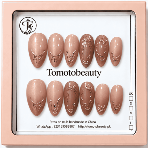Rose pink nude almond press on nails with metallic rose gold raised linework swirl decorations B004