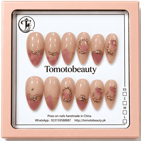 Blush nude pink almond press on nails with rose gold ornamental oval frames and pink French tip accents, Tomoto Beauty B005