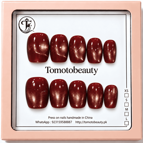 Tomoto Beauty B007: Rich cherry-red magnetic cat-eye press-on nails with a bright reflective streak that shifts through glossy ruby and deep red tones. A striking short s