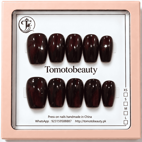 Tomoto Beauty B009: Deep black cherry wine red press-on nails with subtle dark cat-eye reflections and polished glossy shine. A sophisticated short square set for evening