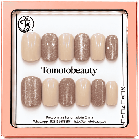 Tomoto Beauty B017: Warm milky cream nails paired with champagne beige glitter accents. The coordinated short square design brings a soft golden shimmer to a timeless nud