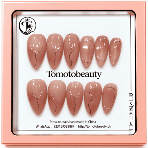 Tomoto Beauty B030: Soft dusty rose nude almond nails with minimal metallic rose-gold abstract Y-shaped lines, curves and outline art. Sleek, elegant and modern.