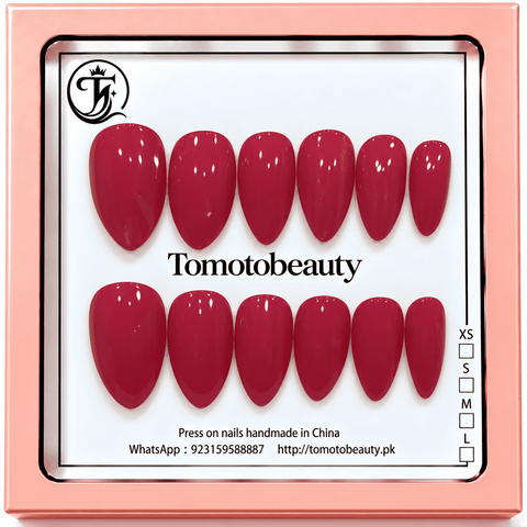 Tomoto Beauty B037: Classic deep ruby-red almond shaped press-on nails with a smooth glossy high-shine finish and clean, minimal colour.