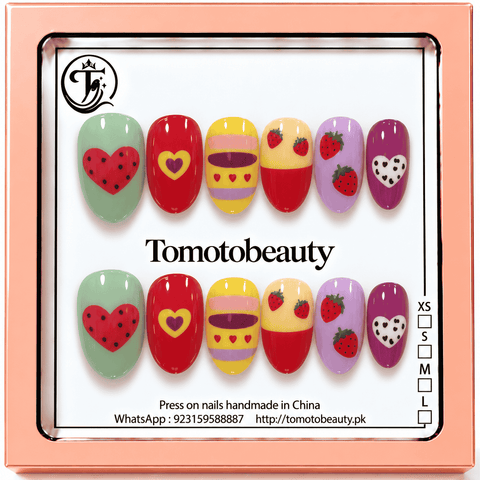 Tomoto Beauty B201 – Rainbow Strawberry Heart Kids Press On Nails. Pastel mint, red, yellow and lavender nail art decorated with strawberries, polka dot hearts and colourful stripes.