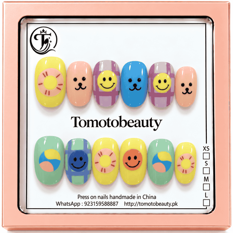 Tomoto Beauty B206 – Happy Smiley Sunshine Kids Press On Nails. Playful pastel yellow, pink, blue, mint and lavender nails with smiling faces, sunshine and cheerful checked patterns.