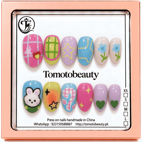 Tomoto Beauty B207 – Pastel Bunny Flower Star Kids Press On Nails. Colourful pink, purple, blue and lime cartoon nails with a sweet bunny, little flowers, stars and green hearts.