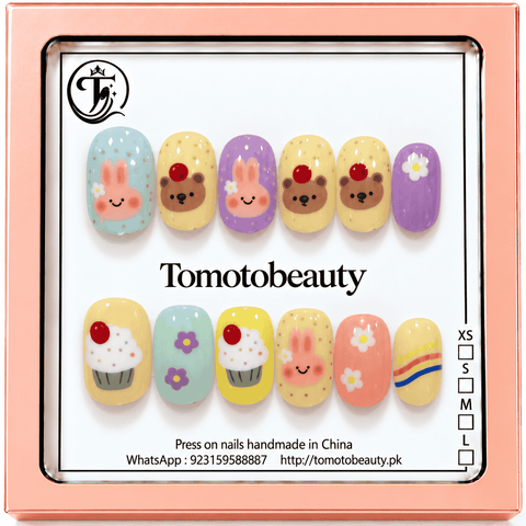Tomoto Beauty B208 – Cute Bunny Bear Cupcake Kids Press On Nails. Sweet pastel bunny and teddy bear faces on mint, yellow, pink and lavender nails with tiny daisies and cupcake art.
