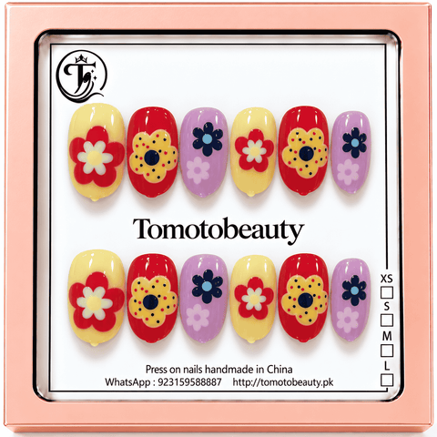 Tomoto Beauty B209 – Colourful Retro Flower Kids Press On Nails. Bright yellow, red and lavender nails adorned with bold red, yellow, blue and white retro flower motifs.