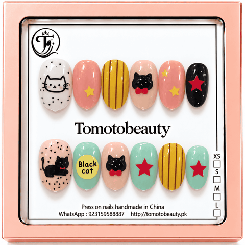 Tomoto Beauty B212 – Black Cat Star Cartoon Kids Press On Nails. Colourful whimsical nails featuring a white kitty, little black cats, red stars, stripes and candy colours.
