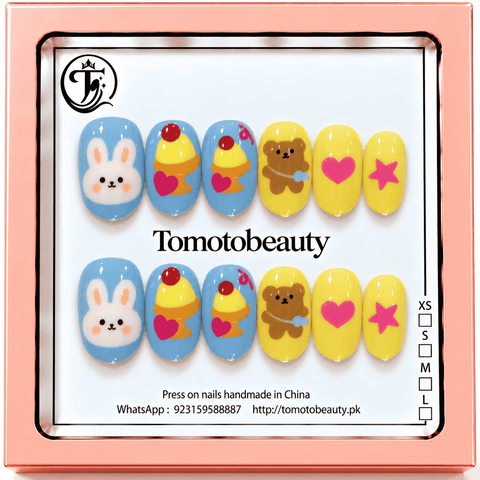 Tomoto Beauty B217 – Bunny Bear Ice Cream Kids Press On Nails. Sky blue and yellow nail art with a cute white bunny, mini ice cream sundaes, teddy bear, pink hearts and stars.