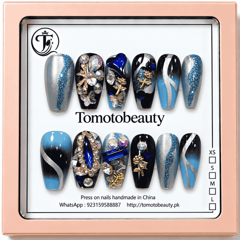 Tomoto Beauty A004 sapphire blue black and silver glitter press on nails with blue gemstones, sparkling rhinestones, metallic floral charms and butterfly accents, 12-piece nail set